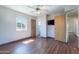 Inviting bedroom with updated floors and fresh paint, plus an adjacent private bathroom for convenience at 6121 N 11Th St, Phoenix, AZ 85014