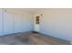Spacious carport featuring convenient storage and a well-lit entry door, offering secure parking at 6121 N 11Th St, Phoenix, AZ 85014