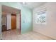 Inviting entryway features neutral tile flooring and a freshly painted interior with an abundance of natural light at 6121 N 11Th St, Phoenix, AZ 85014