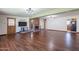 Bright living room with hardwood floors, fireplace, and mini-split AC at 6121 N 11Th St, Phoenix, AZ 85014