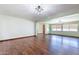 Open living room showcasing hardwood floors, ample natural light, and neutral decor ready for personalization at 6121 N 11Th St, Phoenix, AZ 85014