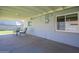 Covered patio with a table and chairs, perfect for outdoor gatherings and relaxation at 6121 N 11Th St, Phoenix, AZ 85014