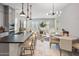 Open-concept kitchen with a large island, stainless steel appliances, and eat in kitchen at 6623 E Marisa Ln, Phoenix, AZ 85054