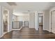 Open loft area with hardwood floors, perfect for a secondary living space or home office at 6623 E Marisa Ln, Phoenix, AZ 85054