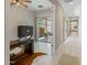Bright home office with sliding glass doors to an outdoor patio at 6623 E Marisa Ln, Phoenix, AZ 85054