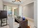 Bright home office with sliding glass doors to an outdoor patio at 6623 E Marisa Ln, Phoenix, AZ 85054