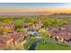 Beautiful homes are surrounded by a well-maintained golf course, mature trees and amazing mountain views at 7751 E Golden Eagle Cir, Gold Canyon, AZ 85118