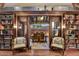 Outdoor patio with built-in bookshelves and a dining table, great for outdoor relaxation at 7751 E Golden Eagle Cir, Gold Canyon, AZ 85118