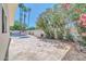 The backyard has a tiled patio, hot tub, swimming pool, and beautiful plants, offering ultimate relaxation and entertainment at 8525 E Vía De Los Libros --, Scottsdale, AZ 85258