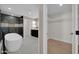 Bathroom showcasing a modern bathtub, separate shower, and access to a walk-in closet at 8525 E Vía De Los Libros --, Scottsdale, AZ 85258