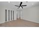 Bright bedroom features closet, recessed lighting, ceiling fan, and hardwood floors at 8525 E Vía De Los Libros --, Scottsdale, AZ 85258