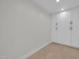 Bright room features built-in cabinets, recessed lighting, and hardwood floors at 8525 E Vía De Los Libros --, Scottsdale, AZ 85258