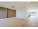 Open-concept living area boasts hardwood floors, modern lighting, and a seamless flow to the kitchen at 8525 E Vía De Los Libros --, Scottsdale, AZ 85258