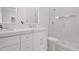 Modern bathroom featuring a double vanity, sleek fixtures, and a glass-enclosed shower at 9477 E Rosemonte Dr, Scottsdale, AZ 85255