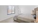 Cozy bedroom with a comfortable bed, natural light, and contemporary design at 9477 E Rosemonte Dr, Scottsdale, AZ 85255