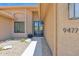 Close up on the front entrance of home with beautiful desert landscaping at 9477 E Rosemonte Dr, Scottsdale, AZ 85255