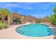 Inviting pool area with a built-in grill, perfect for outdoor entertaining at 9477 E Rosemonte Dr, Scottsdale, AZ 85255