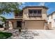 Charming two-story home with a spacious two car garage and manicured landscaping at 10440 E Osage Ave, Mesa, AZ 85212