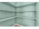Walk-in pantry with ample open shelving and a neutral color palette at 10440 E Osage Ave, Mesa, AZ 85212
