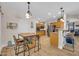 Bright kitchen with wooden cabinets, stainless steel appliances, and eat-in breakfast nook at 10613 E Knowles Ave, Mesa, AZ 85209