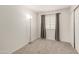 Clean bedroom featuring gray carpet, curtains and natural light from the window at 11290 E Poinsettia Dr, Scottsdale, AZ 85259