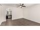 Bedroom features tile floor, ceiling fan, and bathroom access at 11290 E Poinsettia Dr, Scottsdale, AZ 85259
