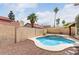 Enjoy a relaxing pool in the backyard with desert landscaping, creating a private retreat at 11290 E Poinsettia Dr, Scottsdale, AZ 85259
