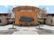 Community clubhouse with modern architecture and landscaping, creating an inviting space at 12232 E Agave Ln, Florence, AZ 85132