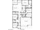 First floor plan showcasing the home's layout, including bedrooms, bathrooms, kitchen, living spaces, and a three-car garage at 12232 E Agave Ln, Florence, AZ 85132