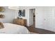 Bedroom with wooden cabinet, painting and decor at 12247 E Agave Ln, Florence, AZ 85132
