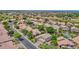 A beautiful aerial view of a community with lush landscaping, homes, and golf course at 1292 N Renee Ave, Gilbert, AZ 85234