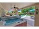 Picturesque backyard with a hot tub, swimming pool, and a well-manicured lawn for outdoor enjoyment at 1292 N Renee Ave, Gilbert, AZ 85234