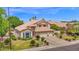 Delightful two-story home boasting a well-maintained lawn and a convenient three-car garage at 1292 N Renee Ave, Gilbert, AZ 85234