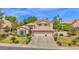 Charming two-story home featuring a three-car garage and well-manicured landscaping at 1292 N Renee Ave, Gilbert, AZ 85234