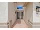 Elegant double front doors with intricate ironwork and a transom window at 1292 N Renee Ave, Gilbert, AZ 85234