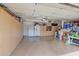 Spacious garage with built-in storage cabinets and ample space for vehicles and storage at 1292 N Renee Ave, Gilbert, AZ 85234
