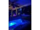 Inviting hot tub with custom lighting and a pool view, perfect for relaxing evenings at 1292 N Renee Ave, Gilbert, AZ 85234