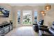 Cozy living room bay window offering a view of the lush front yard at 1292 N Renee Ave, Gilbert, AZ 85234