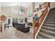 Open living room with fireplace, high ceilings, and lots of natural light at 1292 N Renee Ave, Gilbert, AZ 85234
