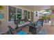 Relaxing outdoor patio space with a comfortable sofa and chairs for leisure and entertainment at 1292 N Renee Ave, Gilbert, AZ 85234