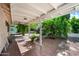 Patio covering backyard with landscaping at 13608 N 19Th Pl, Phoenix, AZ 85022