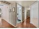 Hallway with tile floors, access to the bathroom, and views of the home's interior at 13608 N 19Th Pl, Phoenix, AZ 85022
