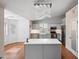 Stylish eat-in kitchen features modern stainless appliances, custom cabinetry, and a central island at 13608 N 19Th Pl, Phoenix, AZ 85022