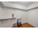 Functional walk-in closet with built-in shelving and ample storage space at 13608 N 19Th Pl, Phoenix, AZ 85022