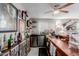 A spacious bar area with wood counters, mini refrigerator, wine rack and ceiling fan at 14001 N 34Th Dr, Phoenix, AZ 85053