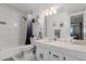 Bathroom with vanity, commode, and shower over bath at 14001 N 34Th Dr, Phoenix, AZ 85053