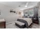 Cozy bedroom with a ceiling fan, soft textures, and a calming color palette to help you unwind at 14001 N 34Th Dr, Phoenix, AZ 85053