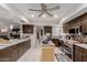 Well-equipped kitchen featuring sleek dark cabinetry, stainless steel appliances, and a functional island at 14001 N 34Th Dr, Phoenix, AZ 85053