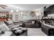 Inviting living room with a comfortable sofa, stylish decor, and ample space for relaxation and entertainment at 14001 N 34Th Dr, Phoenix, AZ 85053