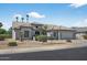Charming single-story home with well-manicured landscaping and a convenient two-car garage at 15753 W Kino Dr, Surprise, AZ 85374